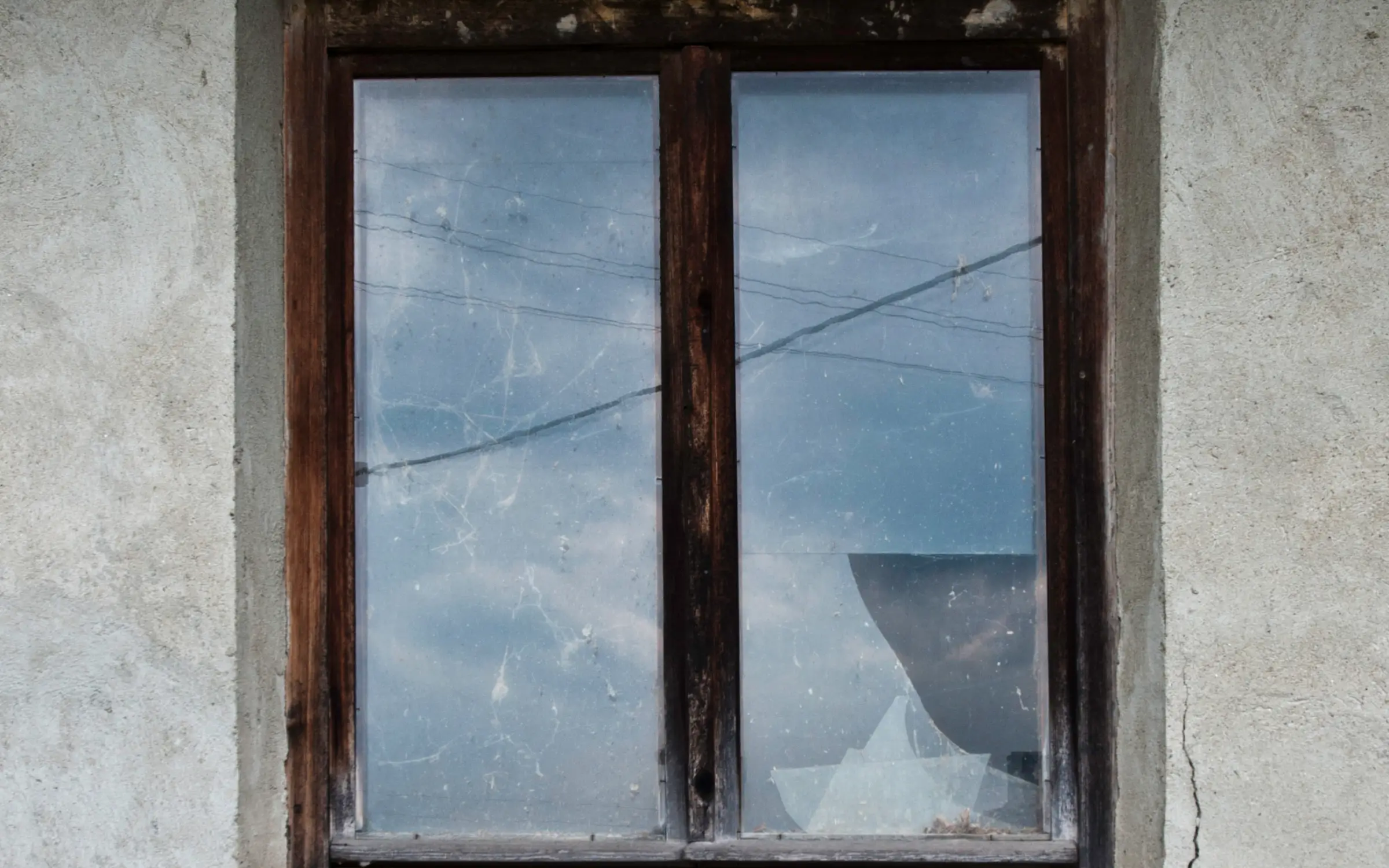 A broken window after storm damage in Maryland