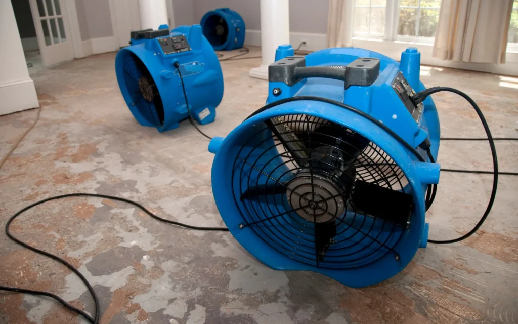 Large water damage drying fans in a residential property, representing water damage restoration in Maryland